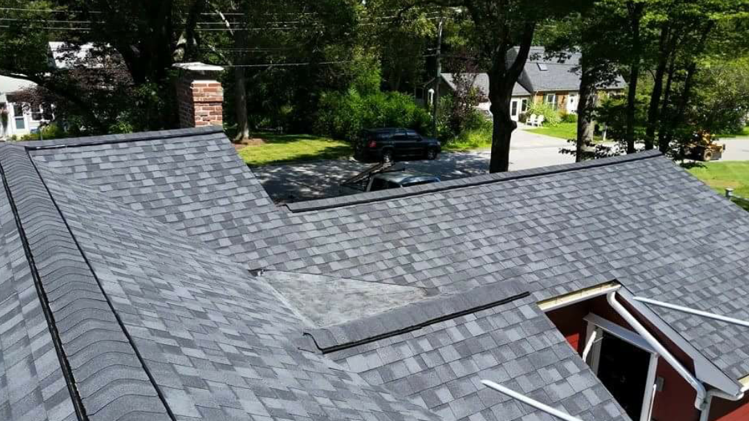 South Shore Roofing team and work vehicle in Cohasset